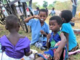 Children tasting porridge